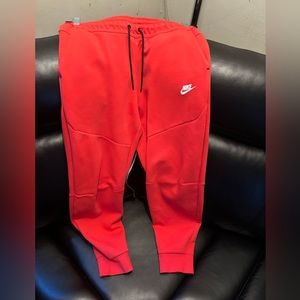 Coral  Nike tech pants